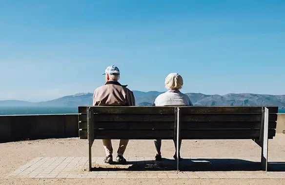 Couple of high-acuity senior residents looking at the landscape